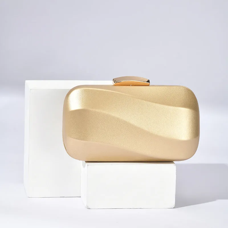 The Ripple Clutch Bag